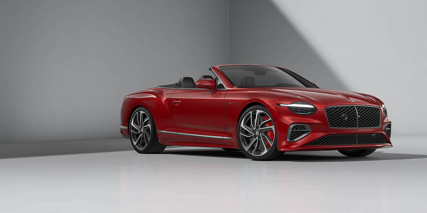 Bentley Mannheim Bentley Continental GTC Speed convertible in Dragon Red paint and 22" swept spoke wheels - front 3/4