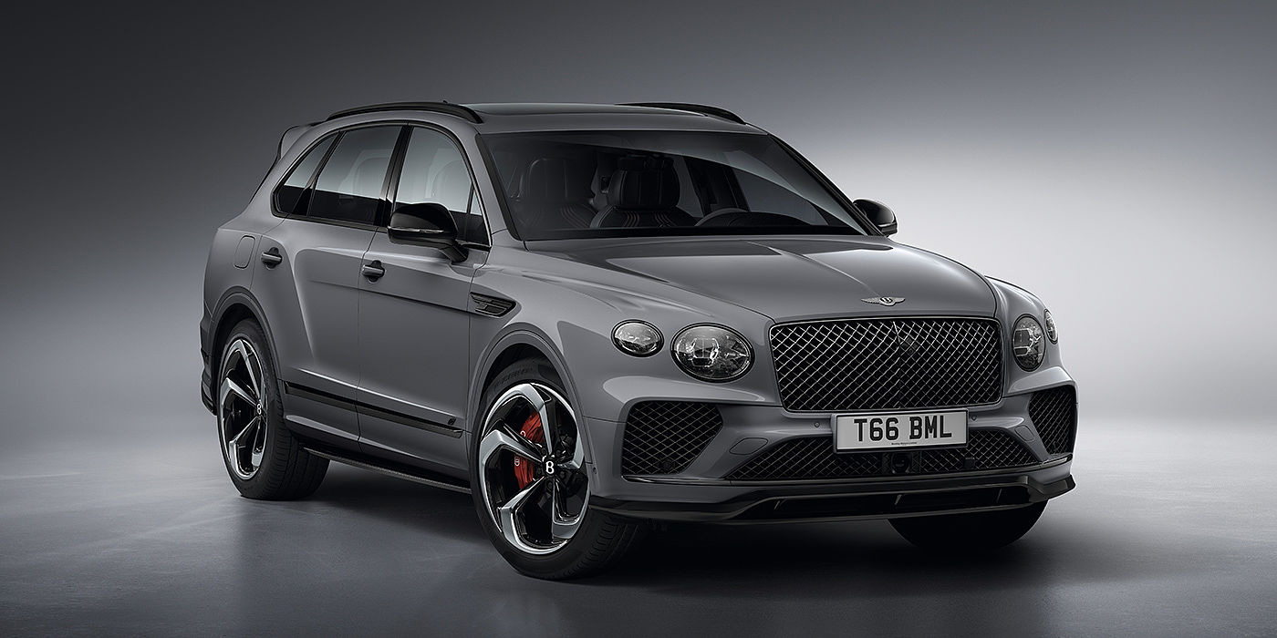 Bach Premium Cars GmbH | Bentley Mannheim Bentley Bentayga S in Cambrian Grey paint front three - quarter view with dark chrome matrix grille and featuring elliptical LED matrix headlights. 