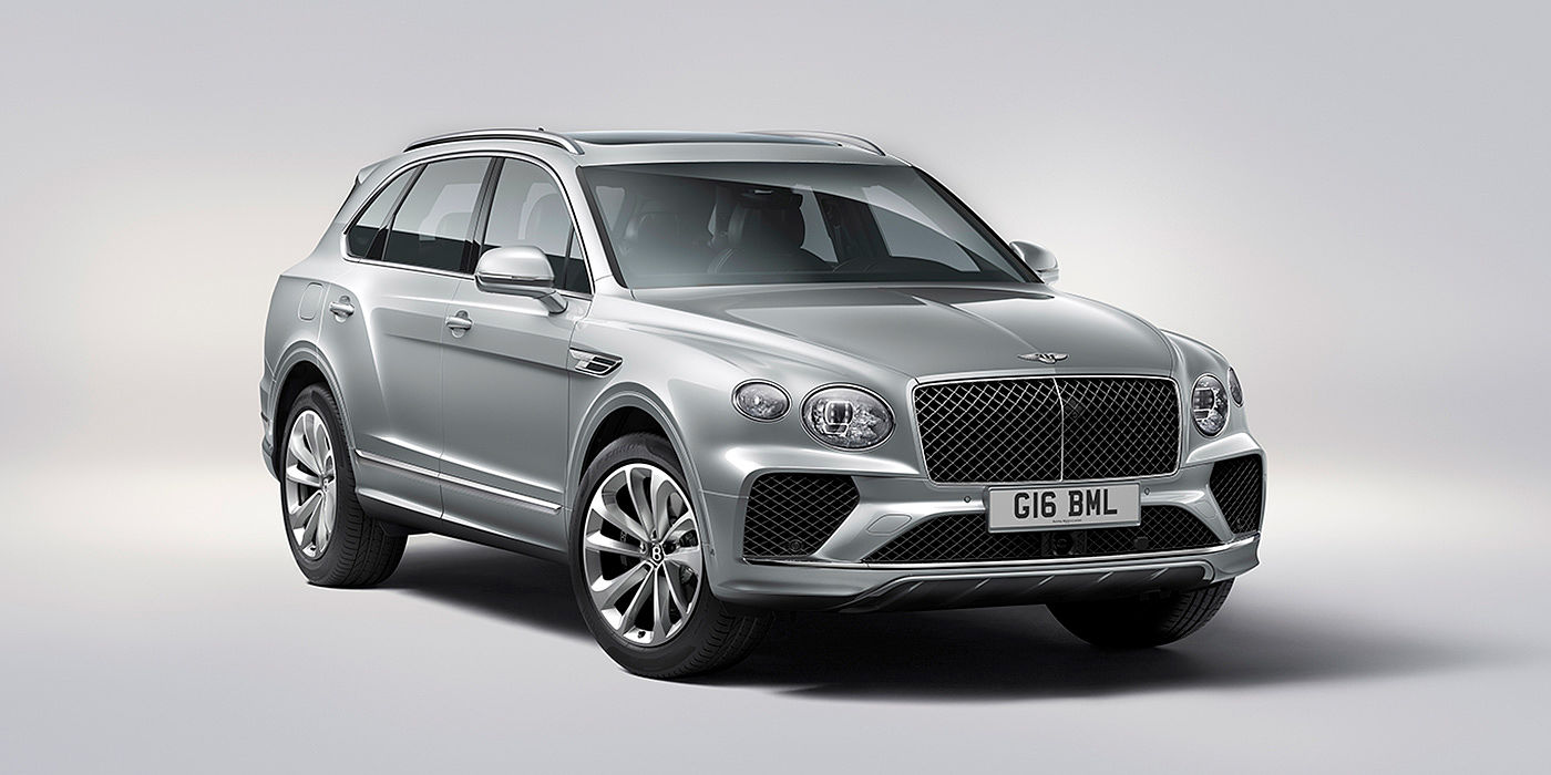 Bach Premium Cars GmbH | Bentley Mannheim Bentley Bentayga in Moonbeam paint, front three-quarter view, featuring a matrix grille and elliptical LED headlights.