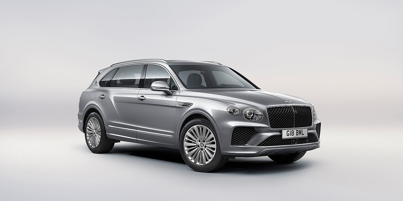 Bach Premium Cars GmbH | Bentley Mannheim Bentley Bentayga Extended Wheelbase luxury SUV front three quarter view in Moonbeam paint with 21 inch five spoke painted wheels