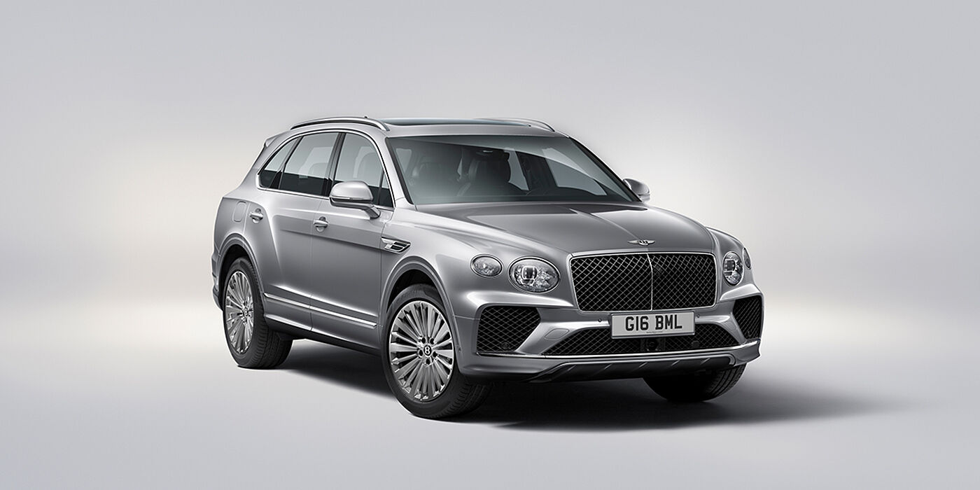 Bach Premium Cars GmbH | Bentley Mannheim Bentley Bentayga luxury SUV front three quarter view in Moonbeam paint with matrix grille and 21″ 5 spoke painted wheels