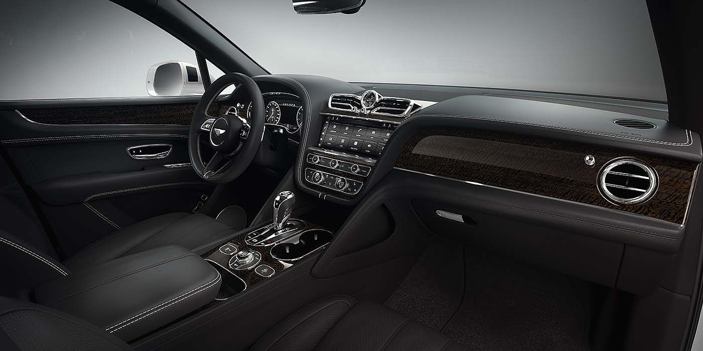 Bach Premium Cars GmbH | Bentley Mannheim Bentley Bentayga EWB SUV front interior in Beluga black leather and Dark Fiddleback Eucalyuptus veneer