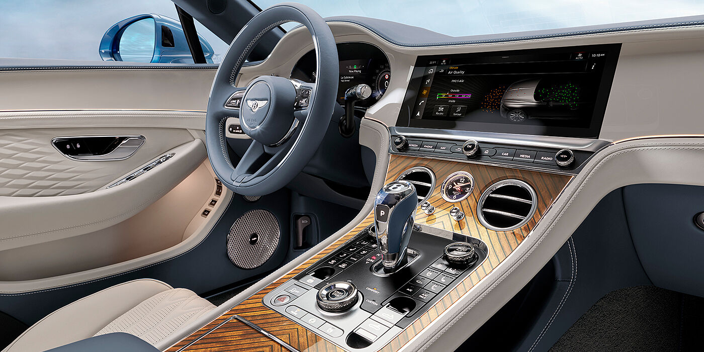 Bach Premium Cars GmbH | Bentley Mannheim New Bentley Continental GTC Azure convertible interior front cabin view with Linen and Brunel hides and Piano Linen by Mulliner veneer featuring centre console and centre MMI screen