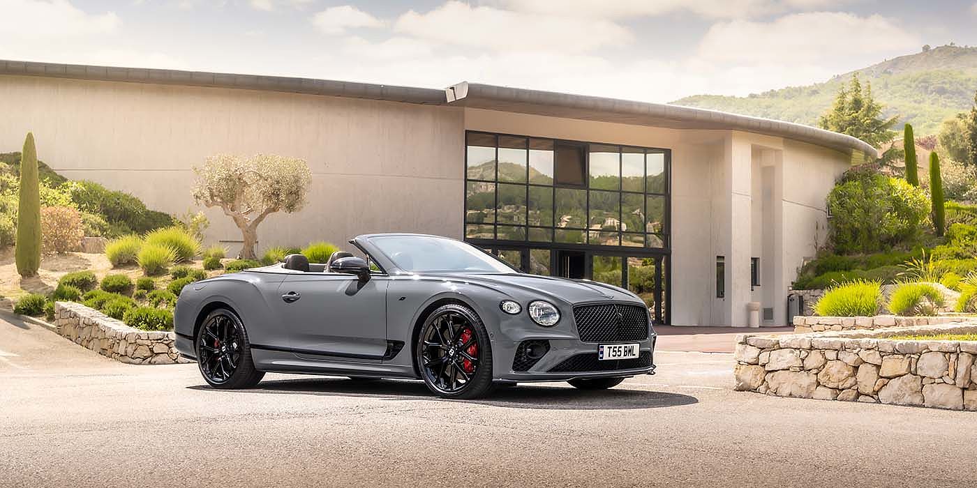 Bach Premium Cars GmbH | Bentley Mannheim Bentley Continental GTC S convertible in Cambrian Grey paint front 34 static near house
