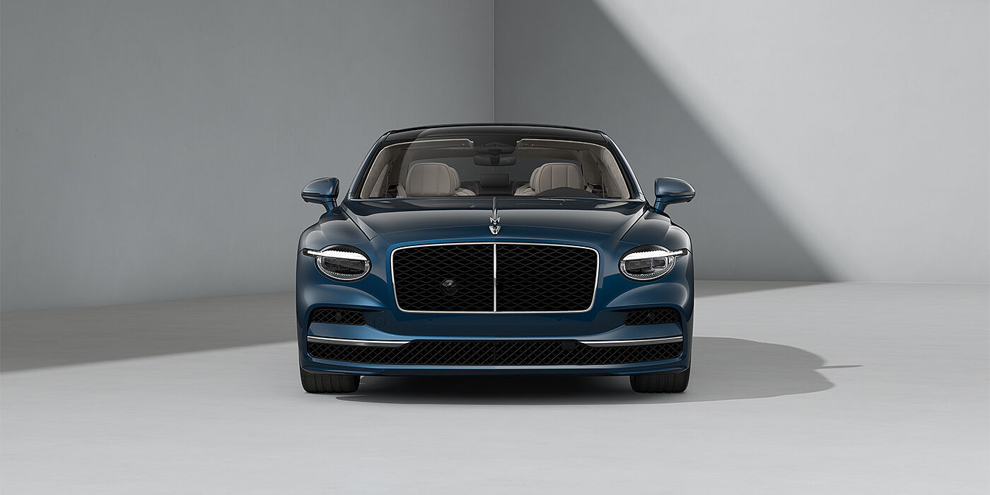 Bentley Mannheim New Bentley Flying Spur sedan in Marlin blue paint full front with 22" Ten Spoke Black Painted and Bright Machined wheels