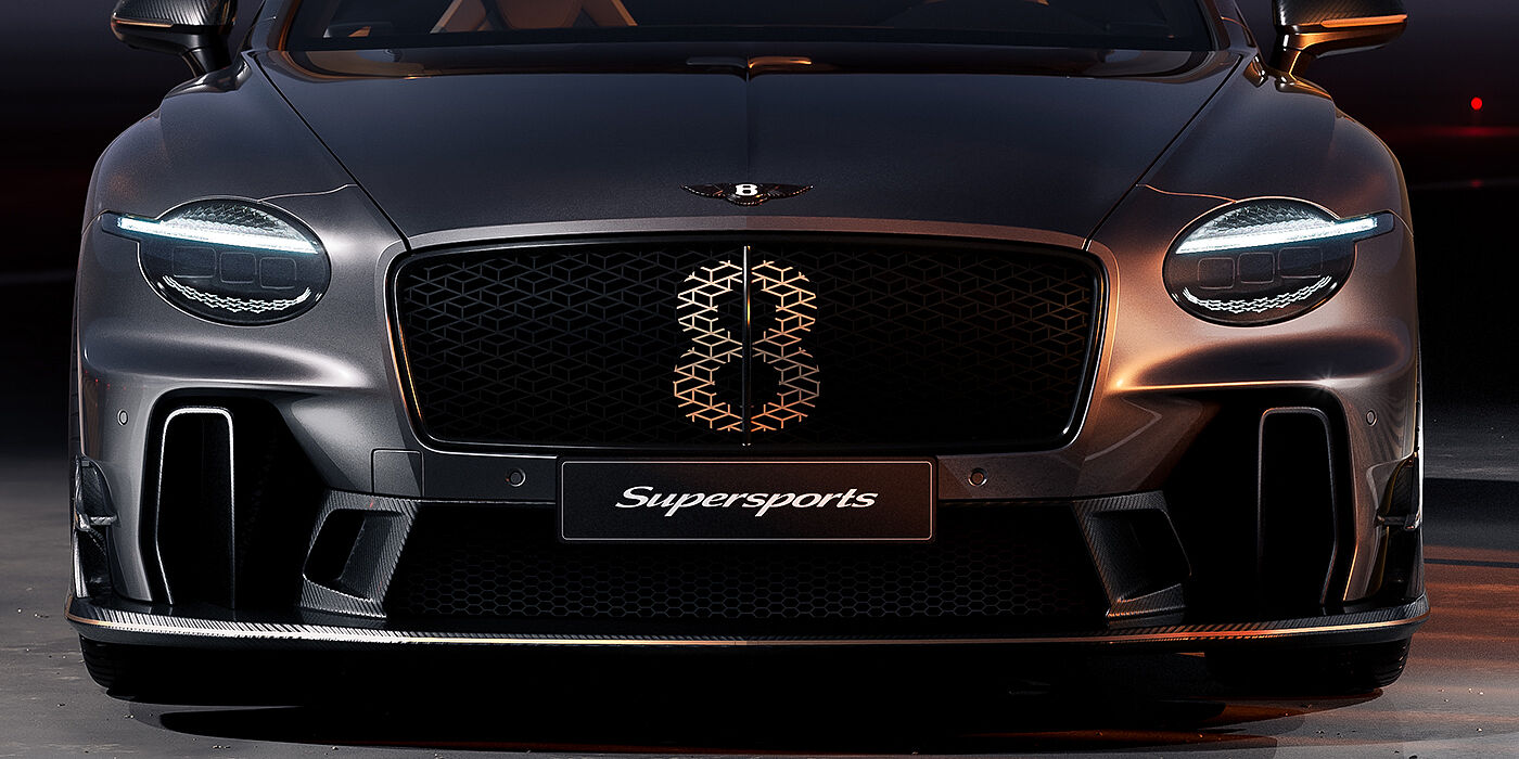 Bach Premium Cars GmbH | Bentley Mannheim Bentley Supersports front exterior with illuminated head lamps and Supersports grille in Anthracite paint