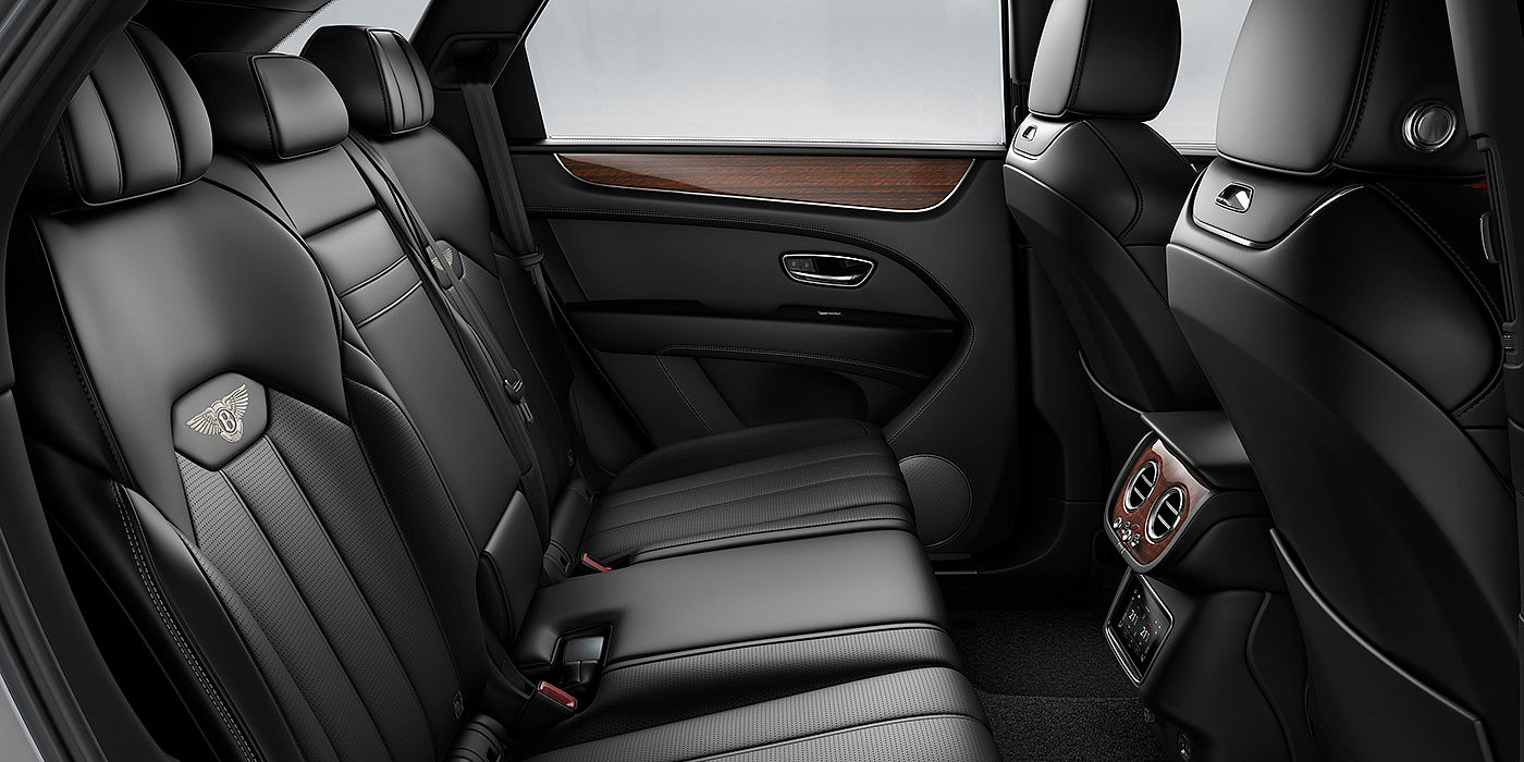 Bach Premium Cars GmbH | Bentley Mannheim Bentey Bentayga interior view for rear passengers with Beluga black hide.