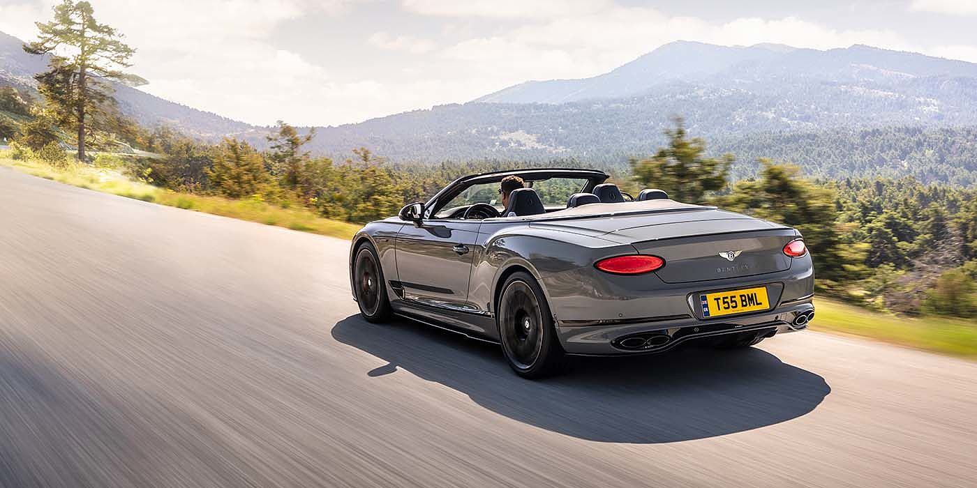 Bach Premium Cars GmbH | Bentley Mannheim Bentley Continental GTC S convertible in Cambrian Grey paint rear 34 dynamic driving