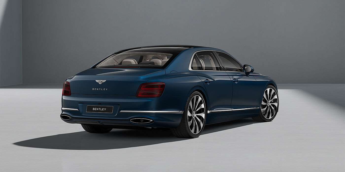 Bentley Mannheim New Bentley Flying Spur sedan in Marlin blue paint rear 3/4 with 22" Ten Spoke Black Painted and Bright Machined wheels