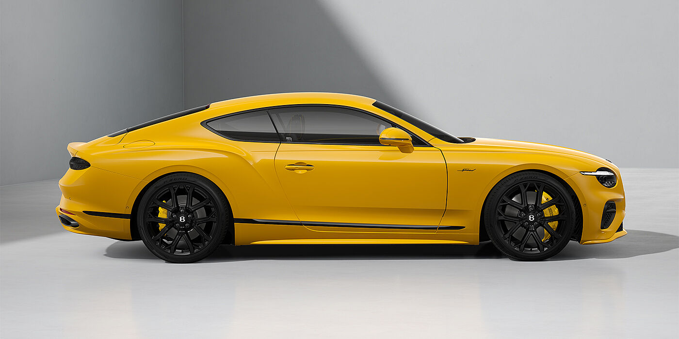 Bentley Mannheim Bentley Continental GT Speed coupe in Monaco Yellow paint and 22" Ten spoke sport wheels - profile