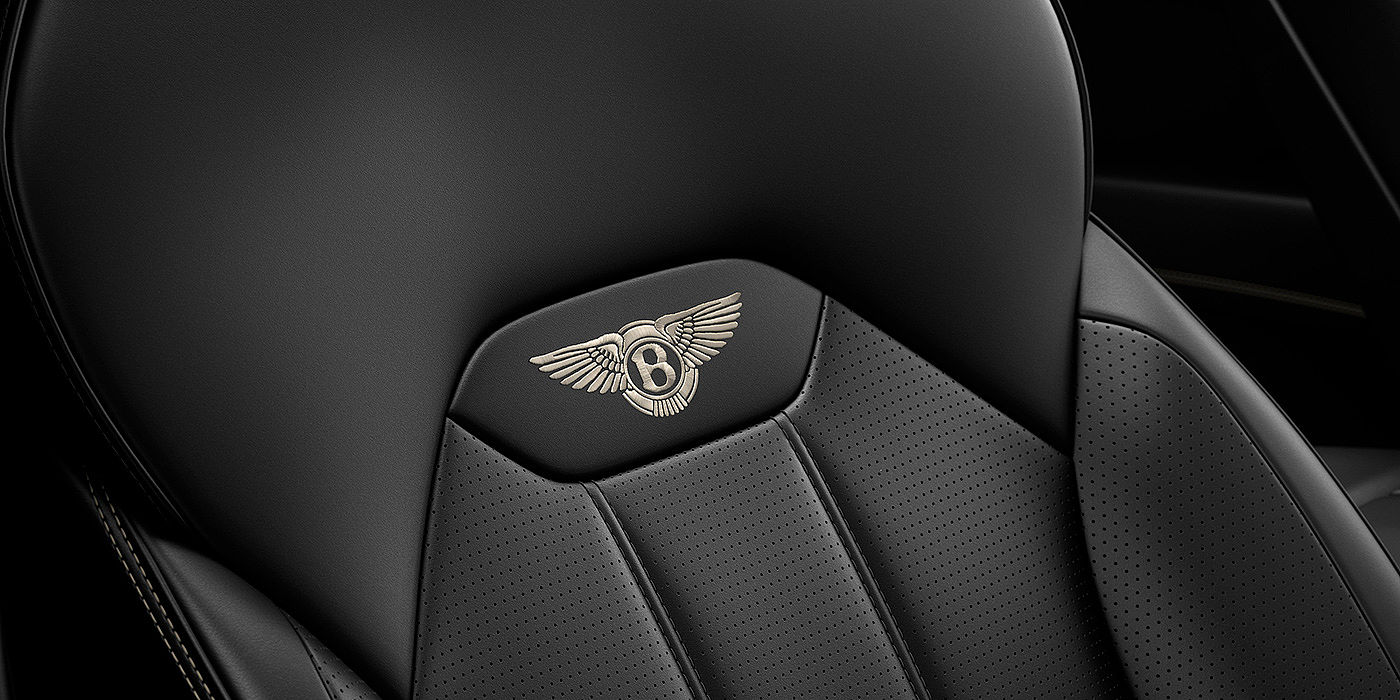 Bach Premium Cars GmbH | Bentley Mannheim Bentley Bentayga seat with detailed Linen coloured contrast stitching on Beluga black coloured hide.