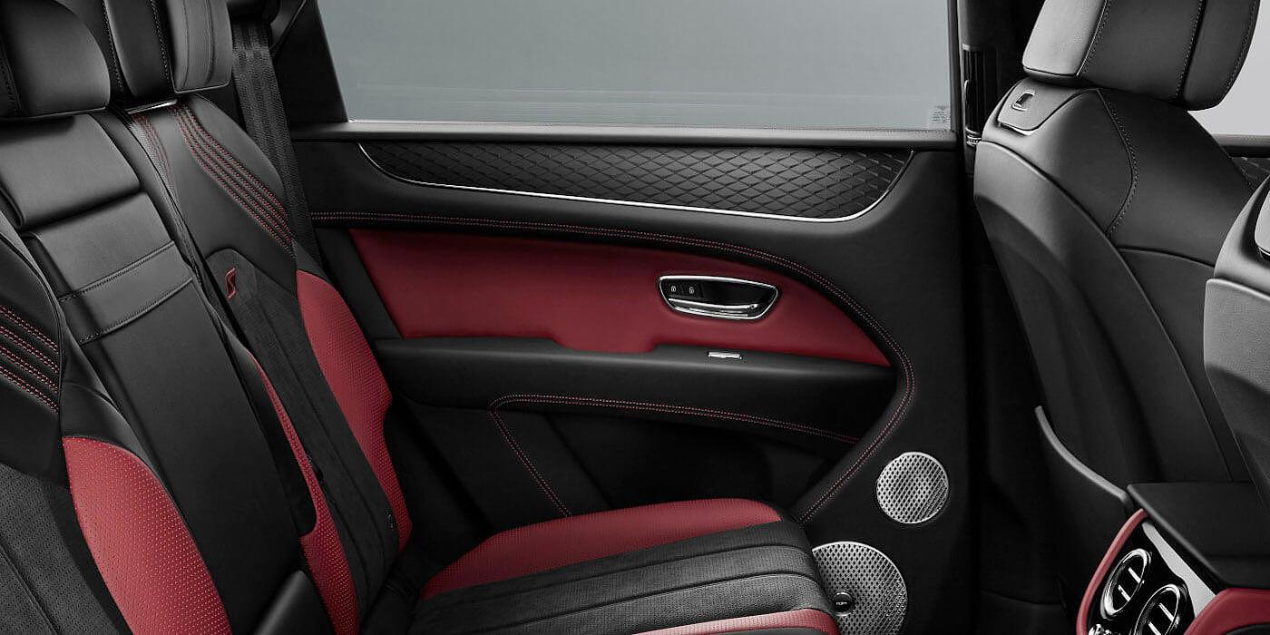 Bach Premium Cars GmbH | Bentley Mannheim Bentley Bentayga S SUV rear interior in Beluga black and Hotspur red hide