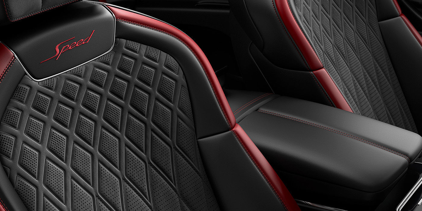 Bach Premium Cars GmbH | Bentley Mannheim Bentley Flying Spur Speed sedan seat stitching detail in Beluga black and Cricket Ball red hide