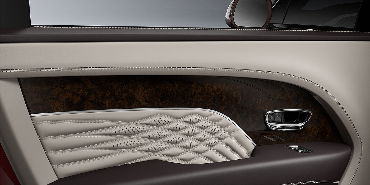 Bentley Mannheim Bentley Bentayga EWB Azure SUV door interior detail in Linen and Burnt Oak hides with Dark Stained Burr Walnut veneer