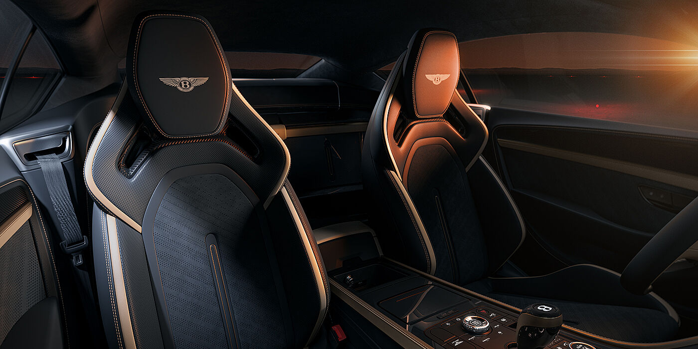 Bach Premium Cars GmbH | Bentley Mannheim Bentley Supersports rear interior with Supersports seats in Camel and Beluga black hides hide and high gloss carbon fibre veneer