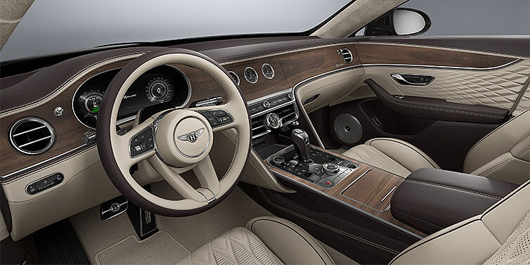 Bentley Mannheim New Bentley Flying Spur Azure sedan front interior in Portland and Burnt Oak hides with Open Pore Crown Cut Walnut veneer