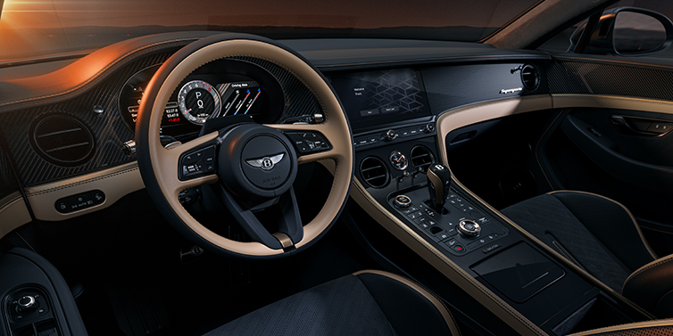 Bach Premium Cars GmbH | Bentley Mannheim Bentley Supersports front interior in Beluga and Camel hides with Bronze accents and high gloss black carbon fibre veneer.