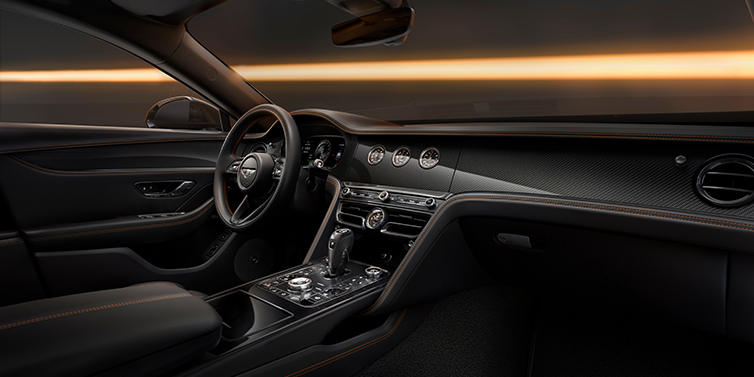 Bach Premium Cars GmbH | Bentley Mannheim Bentley Flying Spur Black Edition sedan front interior in Beluga black hide with High Gloss Carbon Fibre veneer