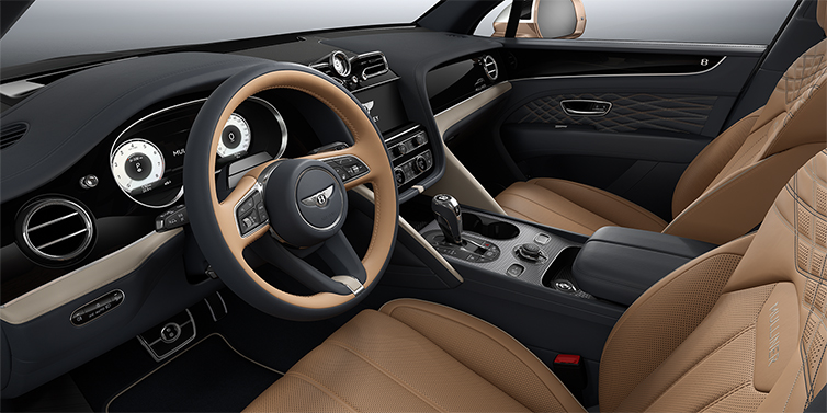 Bentley Mannheim Bentley Bentayga EWB Mulliner SUV front interior in Camel and Brunel hides with Grand Black veneer and Aluminium console